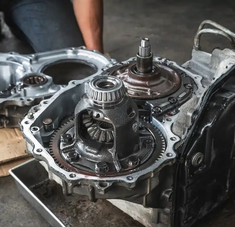 “Close-up of a partially disassembled car transmission system at Cain and Sons’ Automotive in Glen Rock, PA, inspected during ADAS diagnostics and repair services